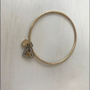 Gold bracelet with heart charms